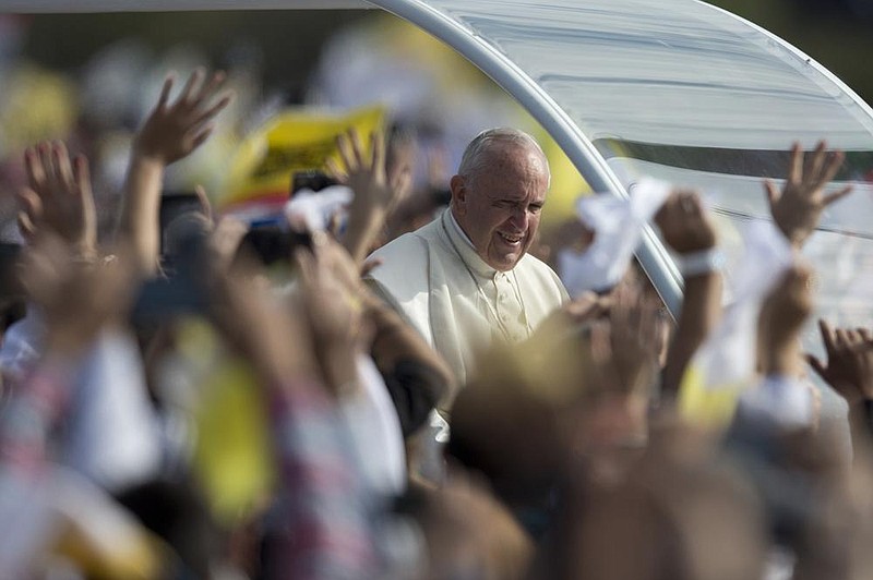 Reaction continued Thursday over comments made by Pope Francis, seen on a 2015 visit to Paraguay, endorsing same-sex civil unions, a break from longstanding church doctrine.
(AP/Natacha Pisarenko)