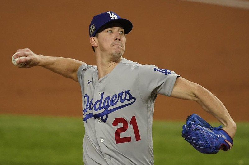Los Angeles Dodgers starting pitcher Walker Buehler allowed 1 run on 3 hits and struck out 10 over 6 innings Friday in the Dodgers’ victory over the Tampa Rays in Game 3 of the World Series at Arlington, Texas.
(AP/Tony Gutierrez) story.lead_photo.caption