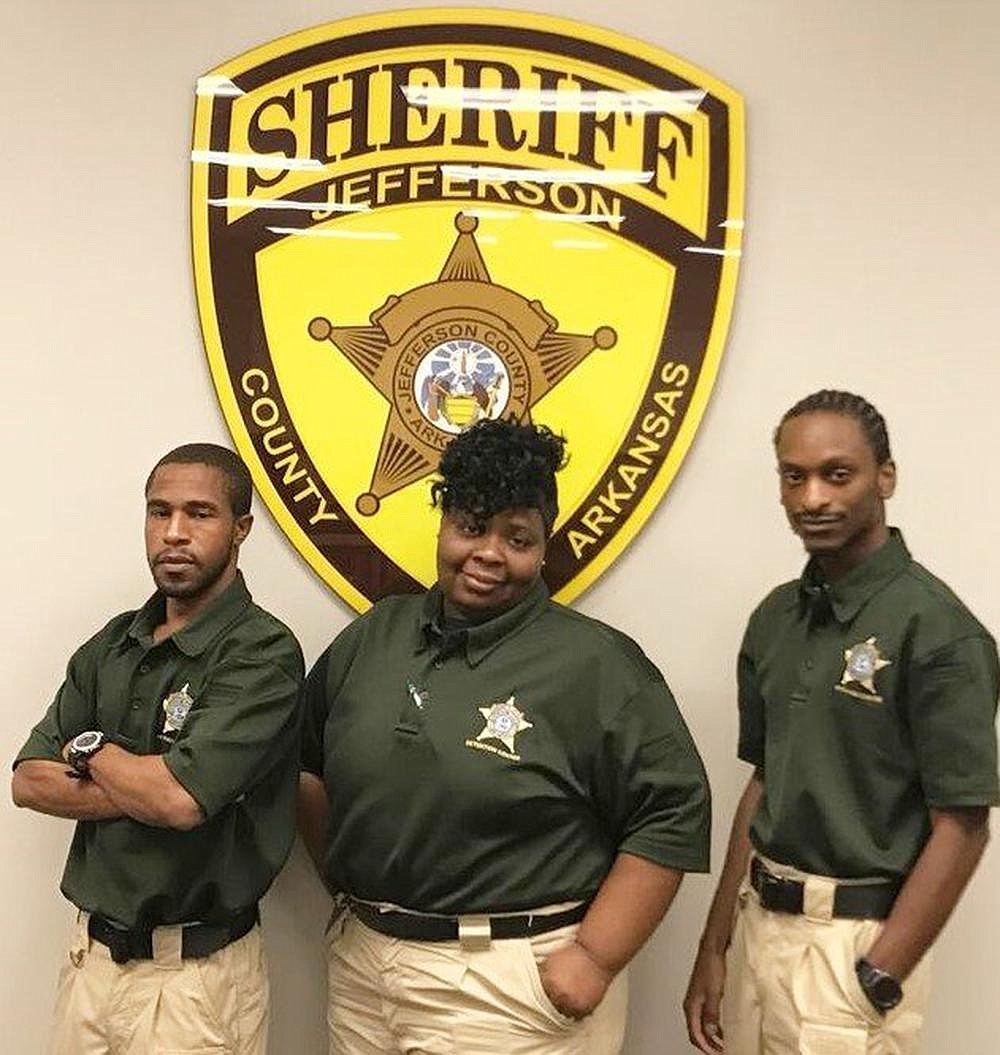 From left, Clifton Gipson, Katina Laws and Madre Collins are graduates of the Jailer Basic Training Course. (Special to The Commercial)