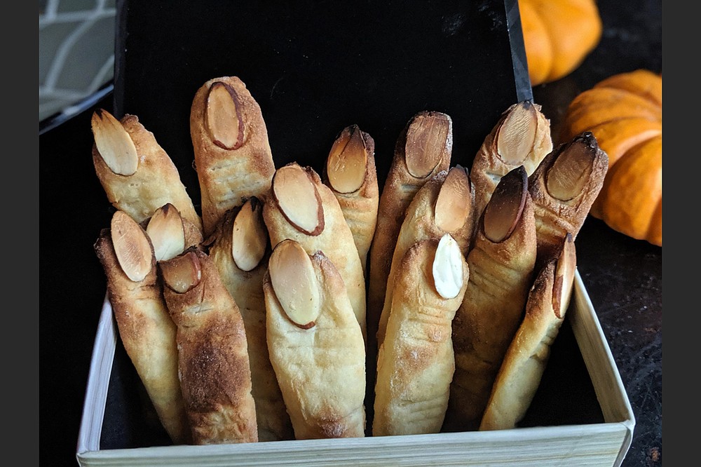 The secret ingredient in these almond-topped witches fingers? Mashed potatoes. (TNS/Pittsburgh Post-Gazette/Gretchen McKay)