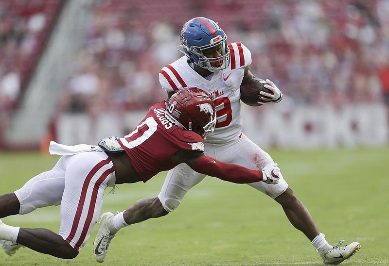 In this file photo Arkansas cornerback Jerry Jacobs, is shown here tackling Ole Miss running back Jerrion Ealy in a 33-21 victory Oct. 17.
 (NWA Democrat-Gazette/Charlie Kaijo)