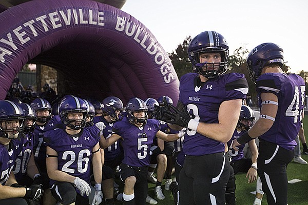 Fayetteville linebacker Kaiden Turner (9) gets ready to lead his teammates onto the field prior to a game against Fort Smith Southside on Friday, Oct. 9, 2020, in Fayetteville. 