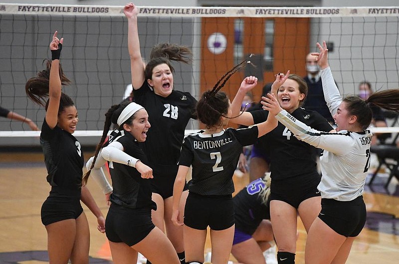 The Bentonville squad celebrates a point against Mount St. Mary Tuesday Oct. 27, 2020 during the first round of the Class 6A state volleyball tournament at Bulldog Arena in Fayetteville. Visit nwaonline.com/2001027Daily/ for a photo gallery. (NWA Democrat-Gazette/J.T.WAMPLER)  