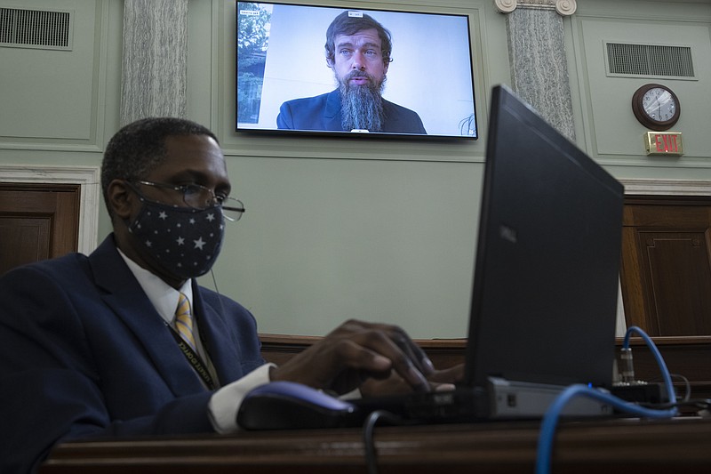 Twitter CEO Jack Dorsey appears on a screen as he speaks remotely during a hearing before the Senate Commerce Committee on Capitol Hill, Wednesday, Oct. 28, 2020, in Washington. The committee summoned the CEOs of Twitter, Facebook and Google to testify during the hearing.