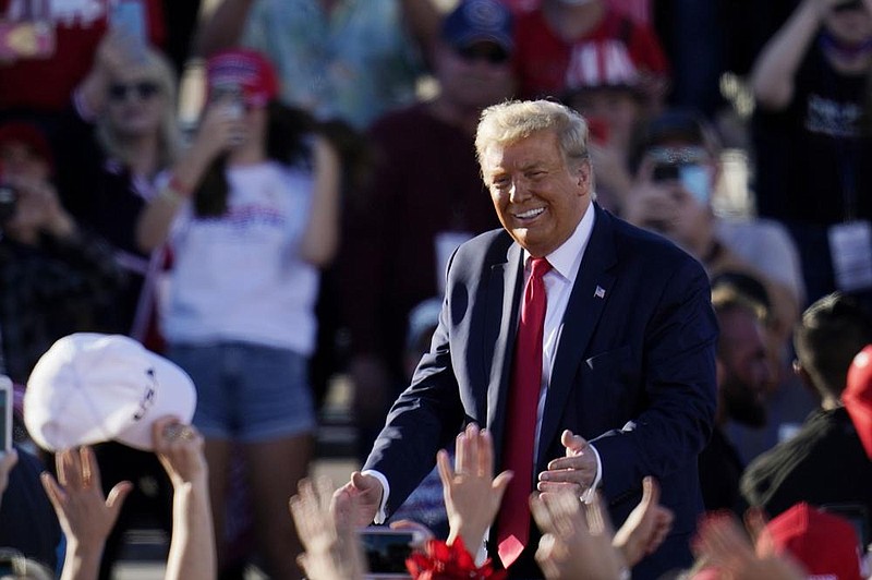 President Donald Trump holds a rally Wednesday at Phoenix Goodyear Airport in Goodyear, Ariz. Trump also campaigned in Bullhead City, Ariz., just across the border from Nevada, and he scoffed at Nevada’s Democratic governor for imposing social distancing rules.
(AP/Ross D. Franklin)