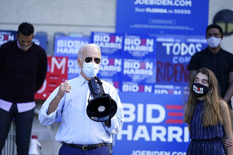 Democratic presidential candidate former Vice President Joe Biden speaks at a drive-in rally at Broward College, Thursday, Oct. 29, 2020, in Coconut Creek, Fla. (AP Photo/Andrew Harnik)

