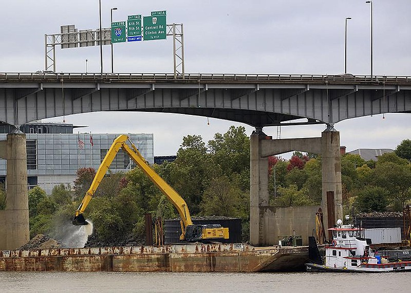 After the ruling Thursday blocking Amendment 91 funding for 30 Crossing, work continued on the first phase of the project under the Interstate 30 bridge between Little Rock and North Little Rock.
(Arkansas Democrat-Gazette/Staton Breidenthal)