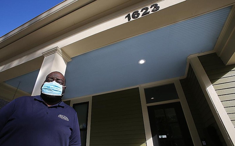 Throughout the South, many front porch ceilings like this one in downtown Little Rock, are painted “haint blue.” It’s an African tradition to ward off evil spirits, says Brian Rodgers, a historian with the Mosaic Templars Cultural Center in Little Rock.
(Arkansas Democrat-Gazette/Thomas Metthe) 