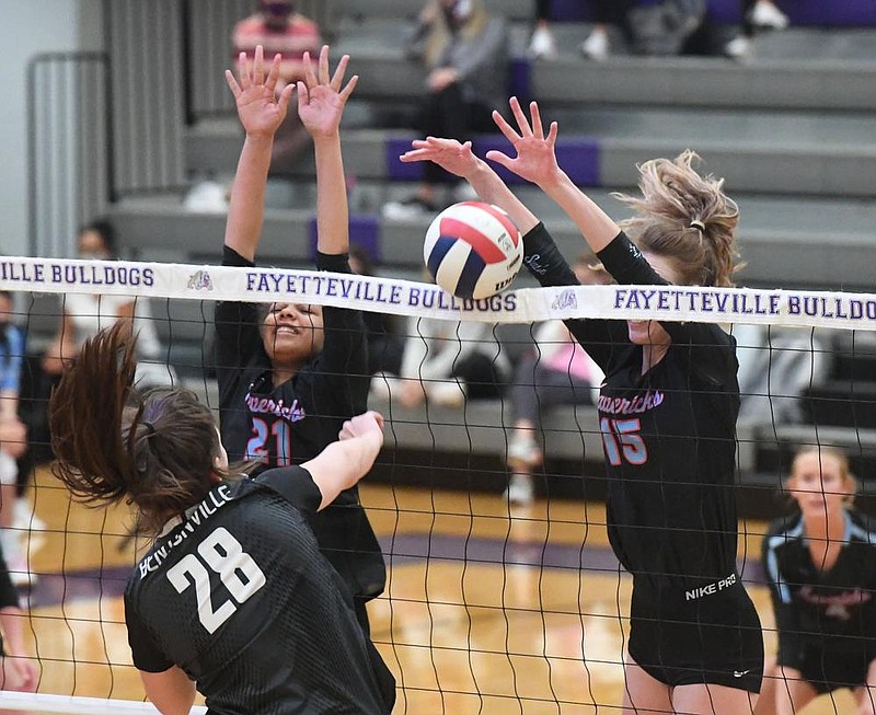 Fort Smith Southside’s Aleigha Johnson (left) and Avery Fitzgerald defend against Bentonville’s Allison Oliphant during a Class 6A state volleyball tournament semifinal Thursday at Fayetteville High School. Southside won 3-0 to move on to Saturday’s championship against Fayetteville.
(NWA Democrat-Gazette/J.T. Wampler)