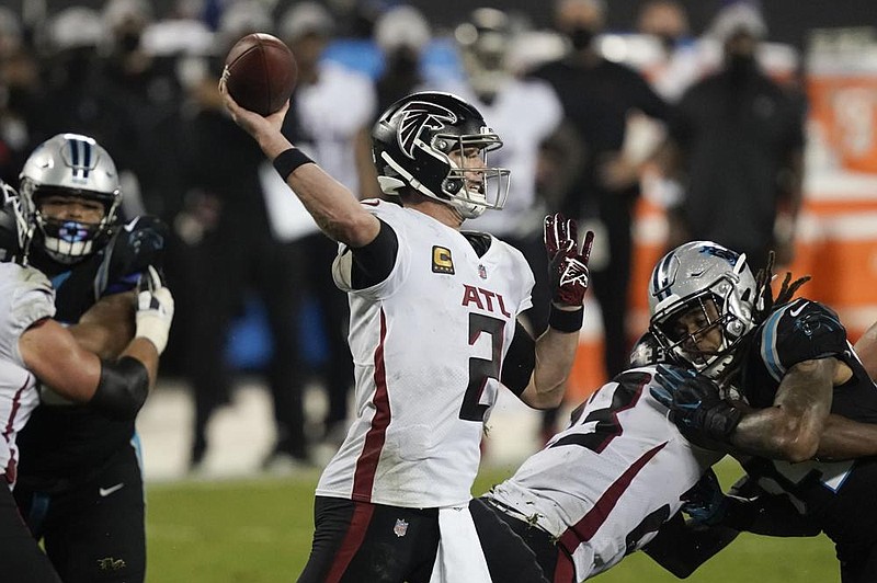 Atlanta quarterback Matt Ryan (2) threw for 281 yards and ran for a touchdown Thursday to lead the Falcons to a 25-17 victory over the Carolina Panthers in Charlotte, N.C.
(AP/Gerry Broome)