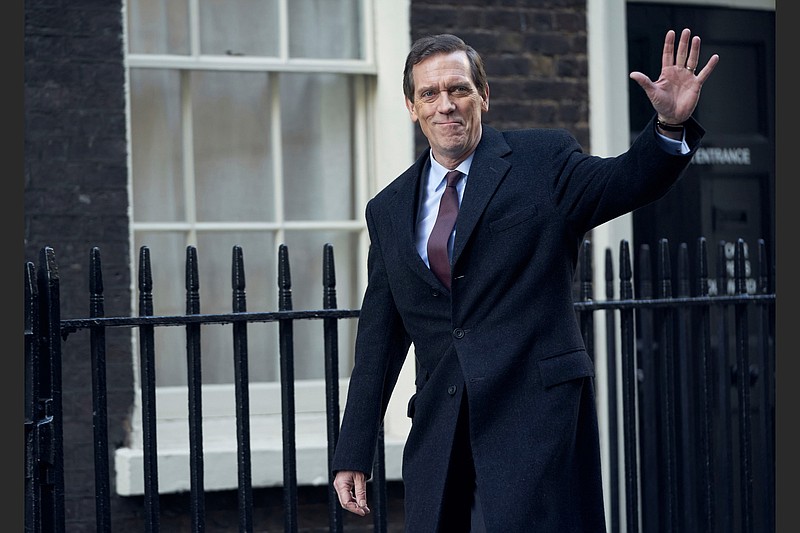 Hugh Laurie plays as a heedless British politician beset by scandal in the four-episode series “Roadkill,” which premiered on PBS’ “Masterpiece” on Sunday. (Masterpiece/PBS via AP)