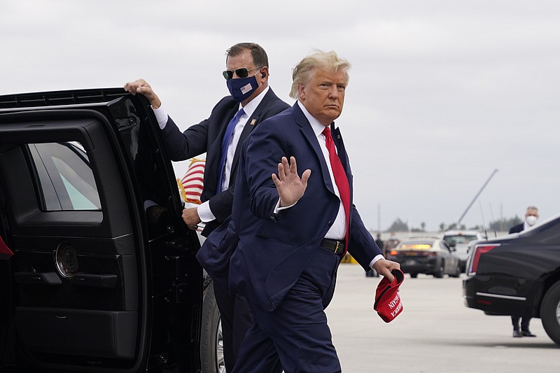 President Donald Trump arrives to board Air Force One for a day of campaign rallies, Monday, Nov. 2, 2020, in Miami.