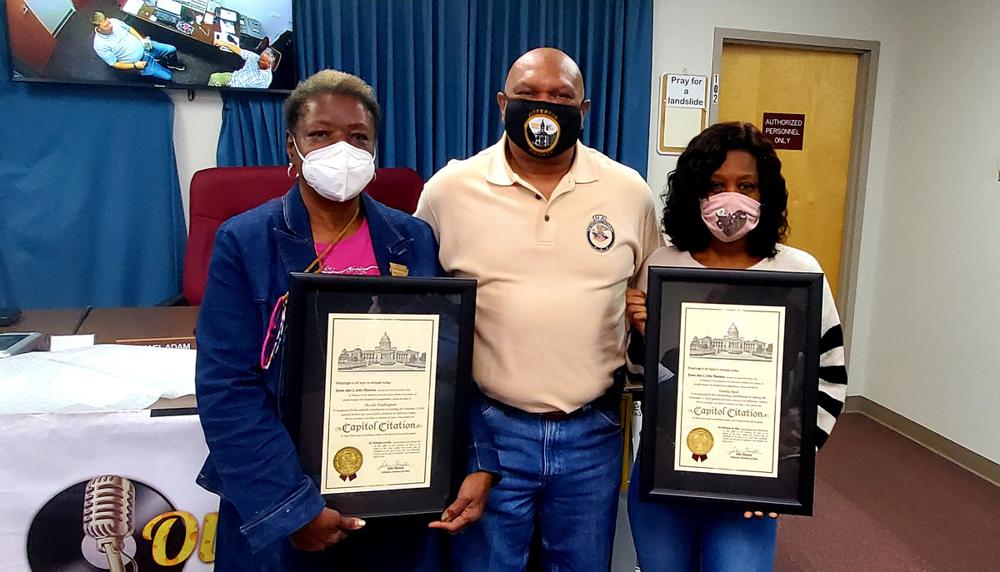 Poll workers receive certificates from state