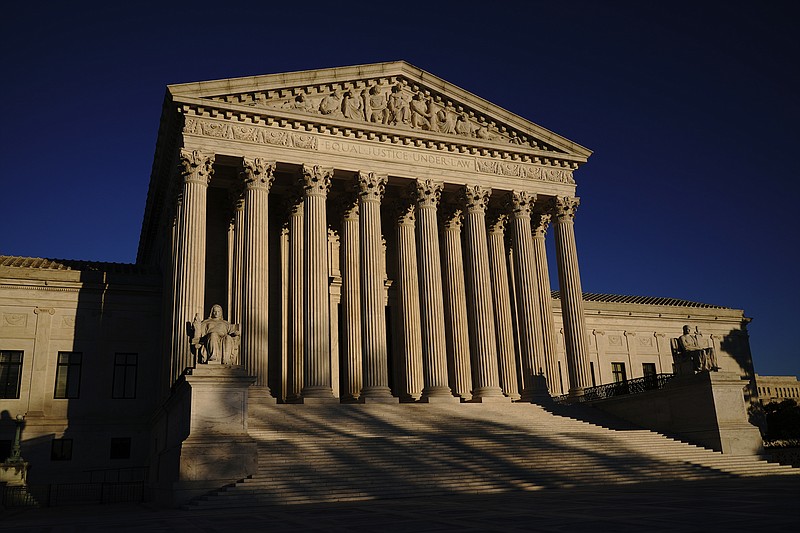 In this Monday, Nov. 2, 2020, file photo the Supreme Court is seen at sundown on the eve of Election Day, in Washington. The Supreme Court is to hear arguments in a case that could put the brakes on what has been a gradual move toward more leniency for children who are convicted of murder. story.lead_photo.caption