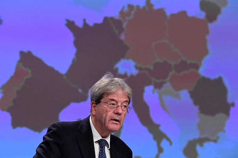European Commissioner for Economy Paolo Gentiloni speaks at a news conference Thursday at European Union headquarters in Brussels.
(AP/John Thys)