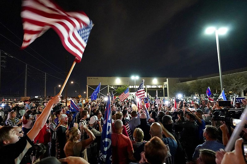 Supporters of President Donald Trump rally Thursday outside the Maricopa County recorders office in Phoenix.
(AP/Matt York)