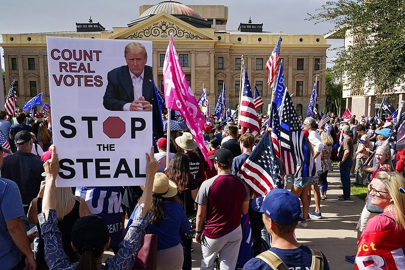 Supporters of President Donald Trump rally outside the Arizona state capitol in Phoenix on Saturday, Nov. 7, 2020.