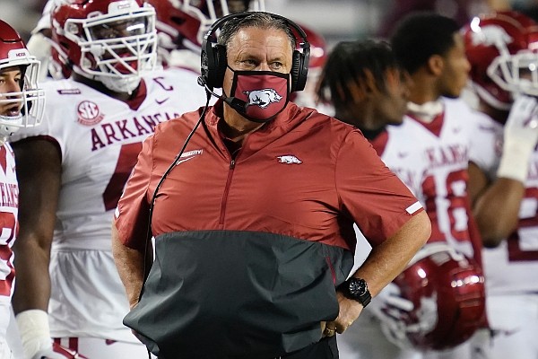 Arkansas head coach Sam Pittman looks on after a call during the first half of an NCAA college football game against Texas A&M on Saturday, Oct. 31, 2020, in College Station, Texas. (AP Photo/Sam Craft)
