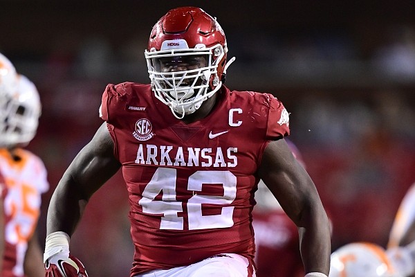 Arkansas defensive tackle Jonathan Marshall celebrates after making a tackle during a game against Tennessee on Nov. 7, 2020 in Fayetteville.