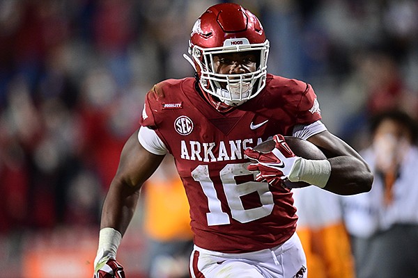 Arkansas receiver Treylon Burks runs for a touchdown during a game against Tennessee on Saturday, Nov. 7, 2020, in Fayetteville. 
