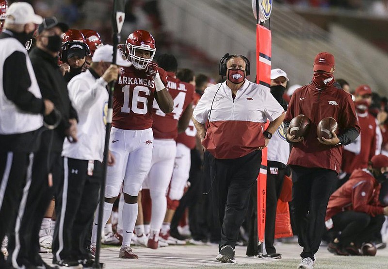 Arkansas head coach Sam Pittman looks on, Saturday, November 7, 2020 during the second quarter of a football game at Donald W. Reynolds Razorback Stadium in Fayetteville. Check out nwaonline.com/201108Daily/ for today's photo gallery. 
(NWA Democrat-Gazette/Charlie Kaijo)