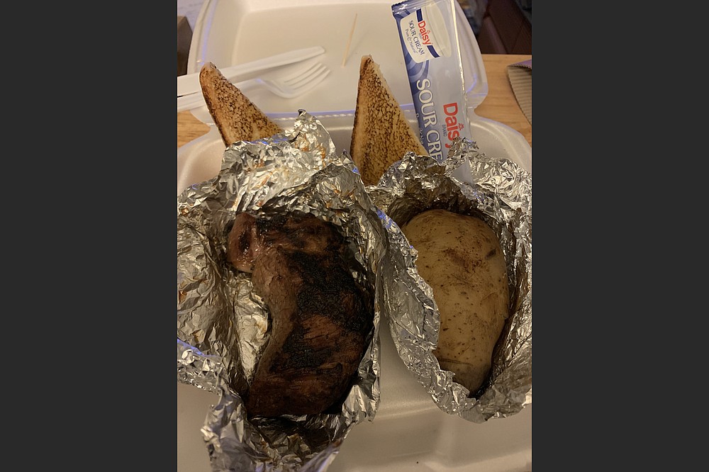 Things have been hopping at Black Angus since it reopened on its former lot spot on West Markham Street; we got a 6-ounce top sirloin and a baked potato with butter and sour cream. (Arkansas Democrat-Gazette/Eric E. Harrison)