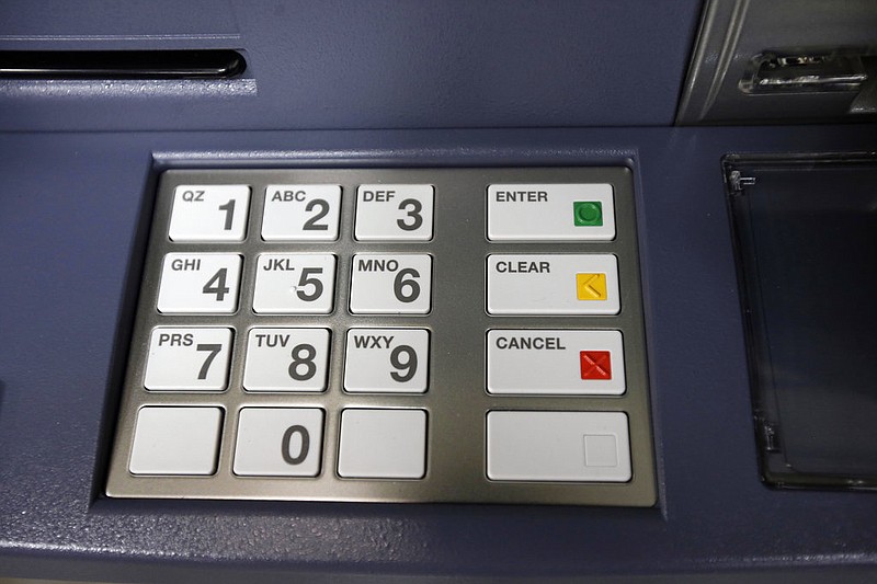 The keypad of a bank's automated teller machine is shown in this Aug. 30, 2017, file photo.