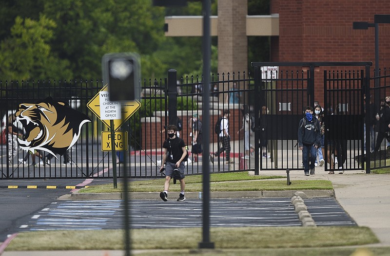 FILE -- Students end the school day, Monday, August 24, 2020 at Bentonville High School in Bentonville. Check out nwaonline.com/200825Daily/ for today's photo gallery.
(NWA Democrat-Gazette/Charlie Kaijo)