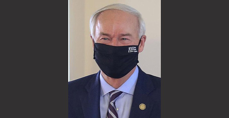 Gov. Asa Hutchinson attends an event Thursday on fundraising for the U.S. Capitol statues of Daisy Gatson Bates and Johnny Cash. Separately, he noted the “challenges” hospitals face as coronavirus cases grow.
(Arkansas Democrat-Gazette/Staton Breidenthal)