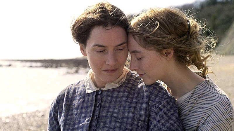 Mary Anning (Kate Winslet) and Charlotte Murchison (Saoirse Ronan) embark on a romance by the ocean in “Ammonite.”