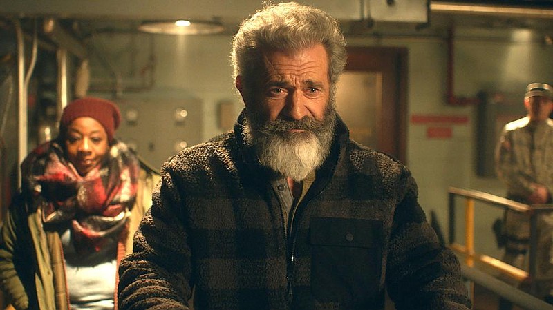 Ruth Cringle (Marianne Jean-Baptiste) has some encouraging words for her husband, Chris (Mel Gibson), aka Santa Claus, in the gritty and surprisingly earnest “Fatman."