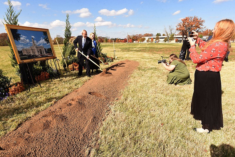 Elder David Harris and his wife, Lisa, pose for photos after the temple ground breaking on Saturday Nov. 7 2020.
(NWA Democrat-Gazette/Flip Putthoff)