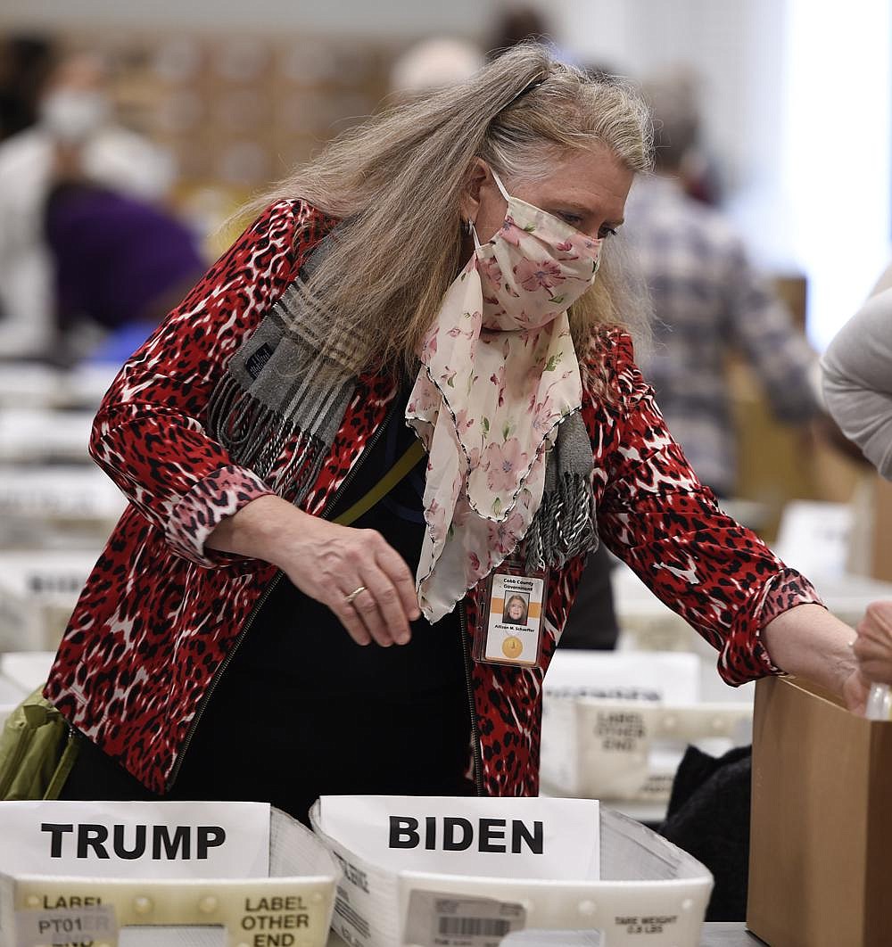 A Cobb County, Ga., election official sorts ballots Friday in Marietta as the statewide hand count of nearly 5 million votes begins. More photos at arkansasonline.com/1114georgia/.
(AP/Mike Stewart)