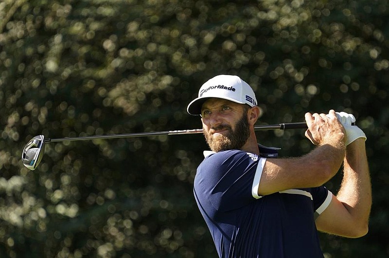 Dustin Johnson shot a 2-under 70 in Friday’s second round of the Masters and shares the lead with Cameron Smith, Justin Thomas and Abraham Ancer, a Masters rookie.
(AP/David J. Phillip)