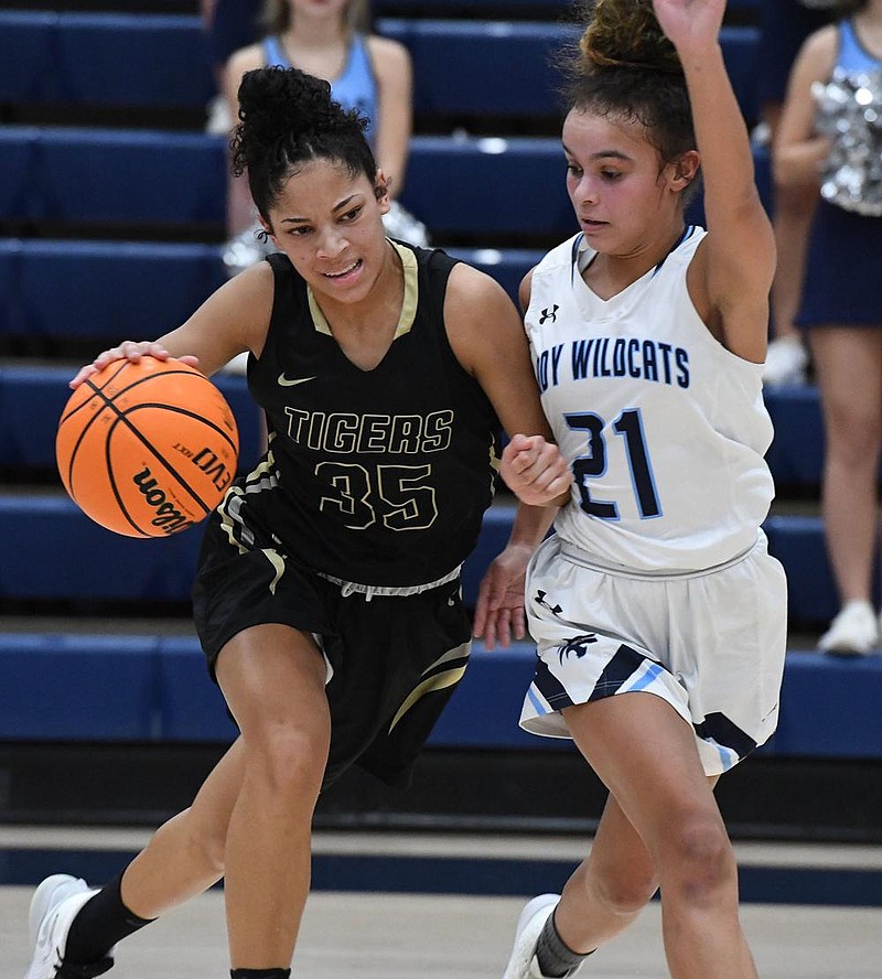 Guard Jada Brown (left) and the Bentonville Lady Tigers won 22 consecutive games last season before nabbing a piece of the 6A state title with Fayetteville.
(NWA Democrat-Gazette/J.T. Wampler) story.lead_photo.caption