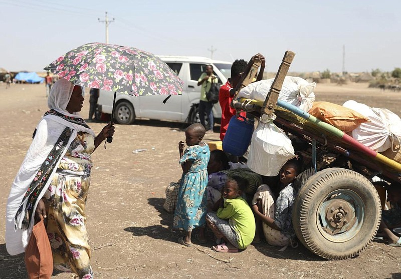 Refugees from the Tigray region of Ethiopia wait to register for admission Saturday at a United Nations center in Hamdayet, Sudan. The fighting in Tigray has caused more than 17,000 refugees to flee into Sudan.
(AP/Marwan Ali)