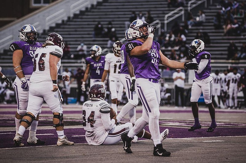 University of Central Arkansas defensive lineman Logan Jessup celebrates after tackling Eastern Kentucky running back Alonzo Booth during Saturday’s game at Estes Stadium in Conway. Jessup finished with 10 tackles and a sack in the Bears’ 37-25 victory over the Colonels to improve to 5-4 this season.
(Photo courtesy University of Central Arkansas)