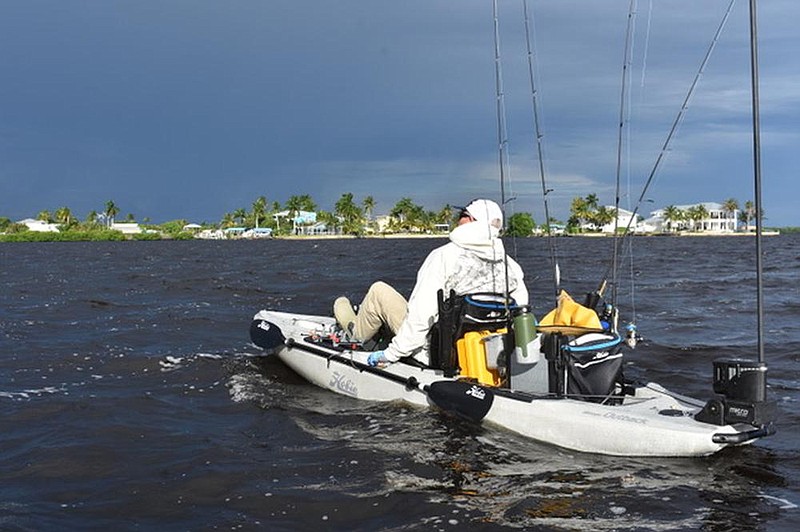 Jerry McBride of Panama City, Fla., crosses an inlet to Matlacha Island on Tuesday evening after getting caught in the open by Tropical Storm Eta.
(Arkansas Democrat-Gazette/Bryan Hendricks)
