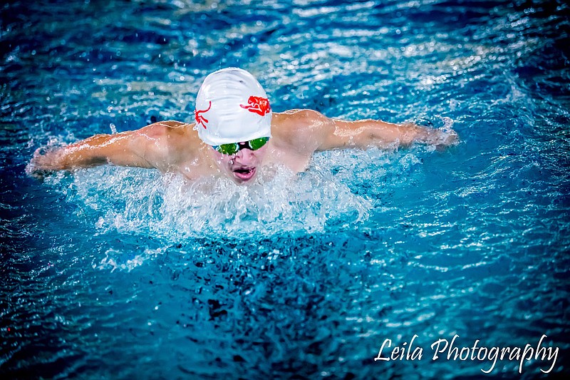 Carson Waters battles in the butterfly competition during Magnolia’s first swim meet of the season. The Panthers and Lady Panthers placed first in the three-team event. On Dec. 12, MHS will compete against other teams at Texarkana’s Texas High School Aquatics.