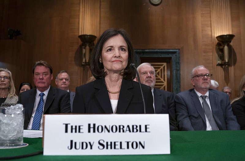 FILE - In this Feb. 13, 2020 file photo, President Donald Trump's nominee to the Federal Reserve, Judy Shelton, appears before the Senate Banking Committee for a confirmation hearing, on Capitol Hill in Washington.