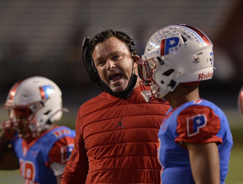 Little Rock Parkview Coach Brad Bolding (center) said preparing for the triple option is always tough. “Nobody is going to stop it,” he said. “You have to score on offense because they will try to limit your time of possession when they’re on offense.” 
(Special to the Democrat-Gazette/Jimmy Jones) 