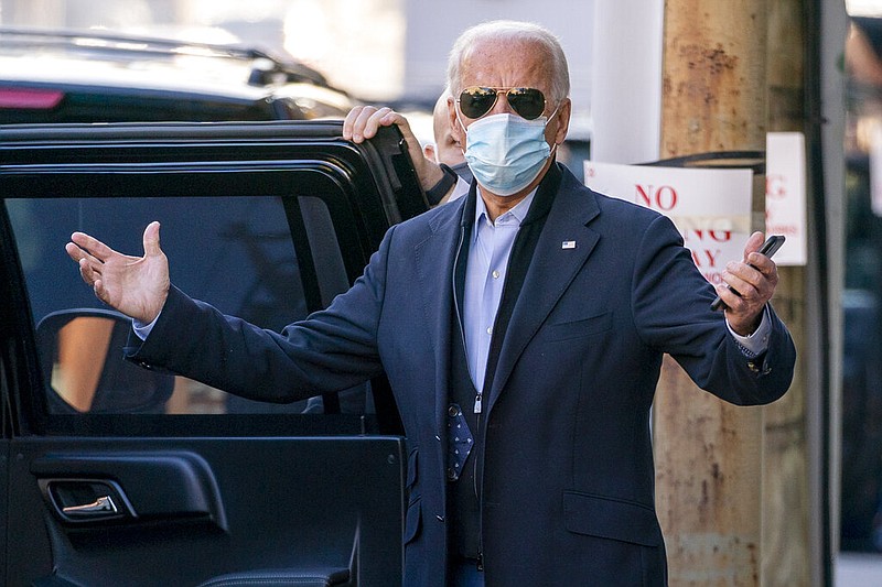 President-elect Joe Biden speaks to reporters as he leaves The Queen theater, Wednesday, Nov. 18, 2020, in Wilmington, Del. (AP Photo/Andrew Harnik)
story.lead_photo.caption