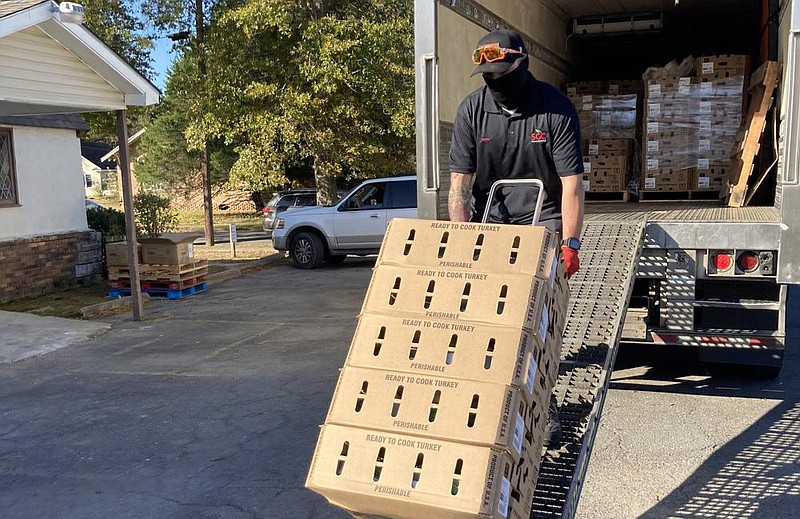 Four hundred turkeys were delivered Thursday morning to Neighbor to Neighbor. Carlton Saffa, chief market officer with the Saracen Casino Resort, organized the donation. 
(Pine Bluff Commercial/Byron Tate)