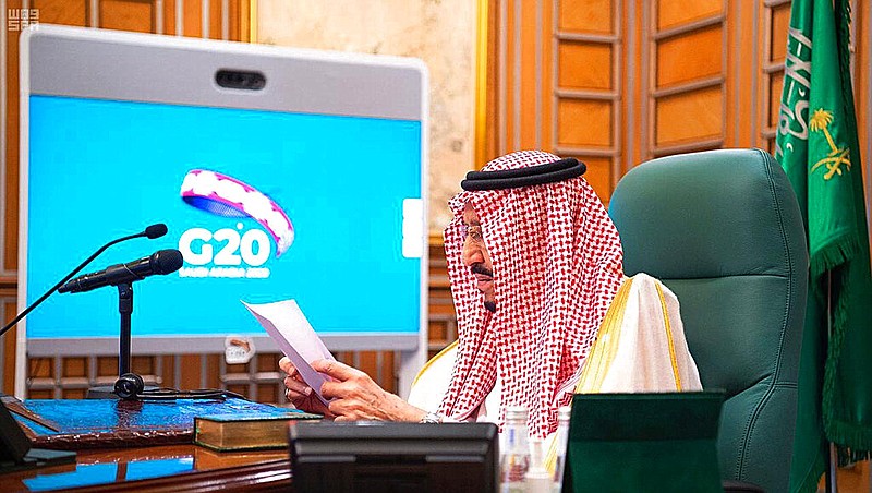 FILE - In this March 26, 2020, file photo released by Saudi Press Agency, SPA, Saudi King Salman, chairs a video call of world leaders from the Group of 20 and other international bodies and organizations, from his office in Riyadh, Saudi Arabia. story.lead_photo.caption