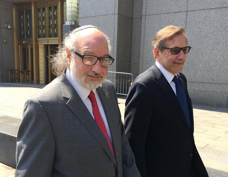 Convicted spy Jonathan Pollard (left) with his lawyer Eliot Lauer leave federal court July 22, 2016, in New York after a hearing.
(AP/Larry Neumeister/File)