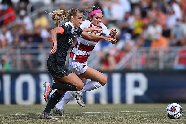Vanderbilt's Ella Shamburger (left) and Arkansas' Parker Goins race for a ball during the championship game of the SEC Soccer Tournament on Sunday, Nov. 22, 2020, in Orange Beach, Ala.