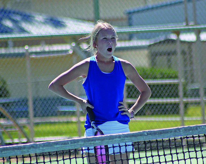 Parkers Chapel's Ali Looney gets caught in a moment of relaxation between points during the conference tennis tournament. Winning a state championship in one sport and finishing as state runner-up in another was hardly boring for the senior Lady Trojan. Looney was named Sports Alley/News-Times Fall Sports Female Athlete of the Year.