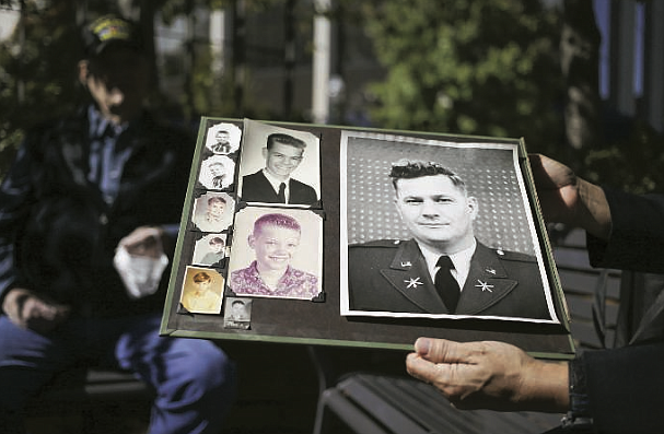 Old photos of King show a dashing young serviceman who joined the Coast Guard when he was just 16. (NWA Democrat-Gazette/Charlie Kaijo)