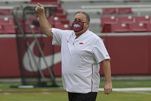 Arkansas head coach Sam Pittman with his team before the start of the Razorbacks game against LSU during an NCAA college football game Saturday, Nov. 21, 2020, in Fayetteville. (AP Photo/Michael Woods)