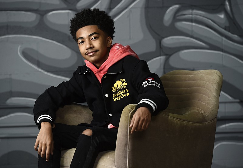 Miles Brown, who plays Jack Johnson on ABC’s “black-ish,” has grown up to be a singer and he has a new album coming out. (The Associated Press/Chris Pizzello)